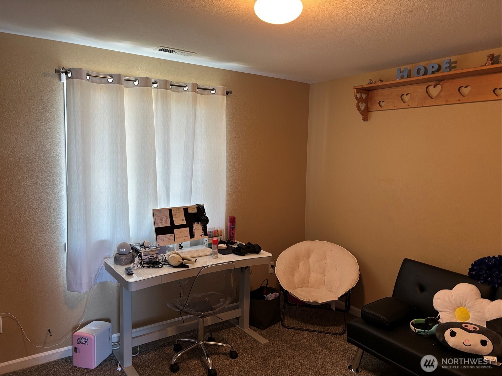 909 Polo Ridge Moses Lake, WA 98837 - Photo 7 of 27 a view of a workspace with furniture and a window
