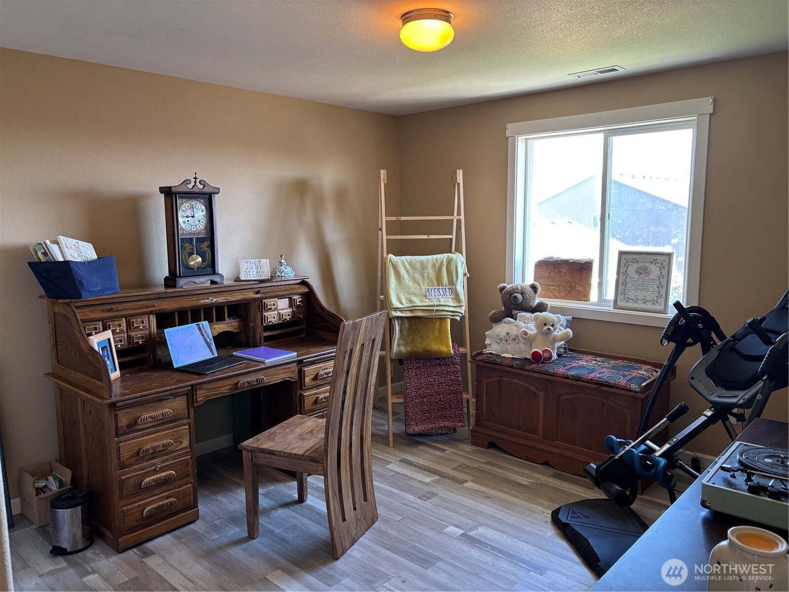 909 Polo Ridge Moses Lake, WA 98837 - Photo 10 of 27 a view of a workspace with furniture and a window