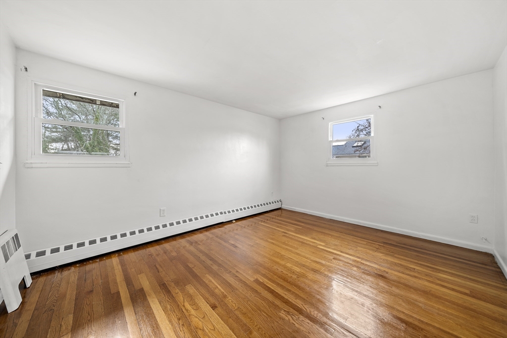 276 Oak Street Brockton, MA 02301 - Photo 21 of 42 a view of a room with wooden floor and window