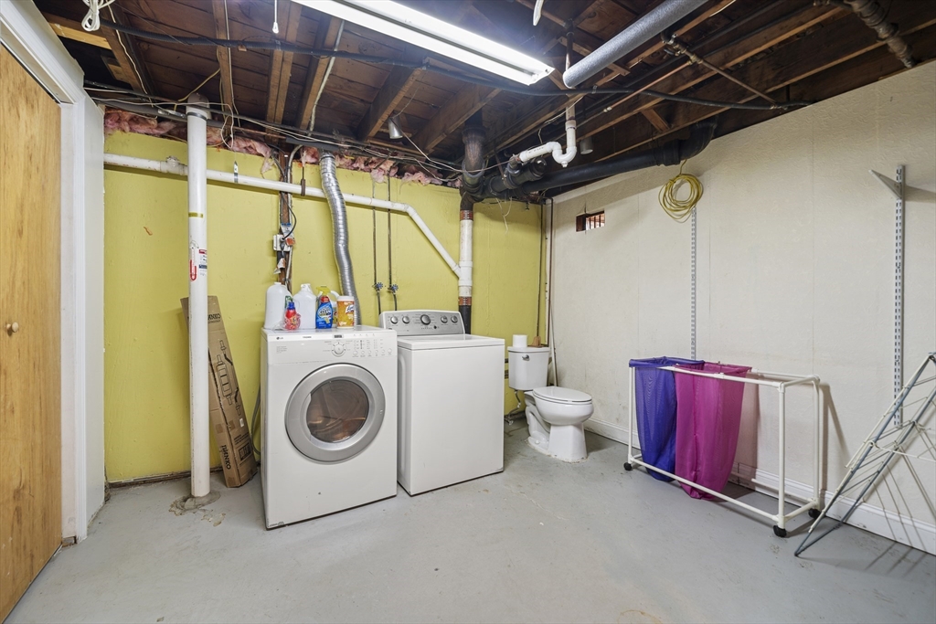 276 Oak Street Brockton, MA 02301 - Photo 32 of 42 a utility room with dryer and washer