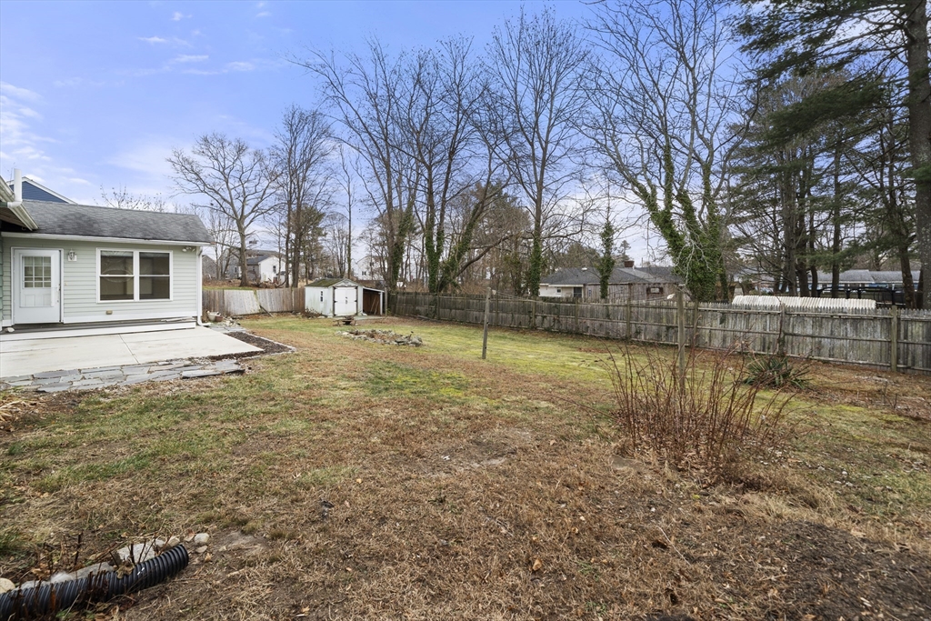 276 Oak Street Brockton, MA 02301 - Photo 39 of 42 a view of a yard with a house