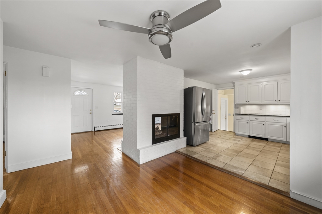 276 Oak Street Brockton, MA 02301 - Photo 7 of 42 a view of a kitchen with a sink and a stove top oven