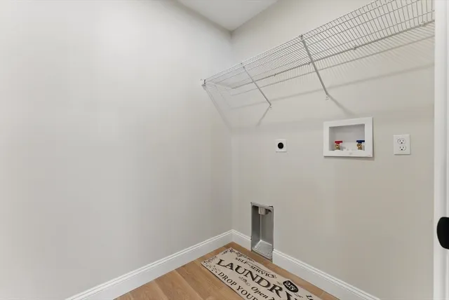 a view of a room with an empty shelf