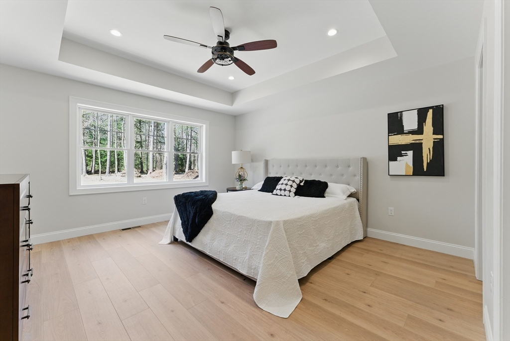 18 Nicols Way, Unit 18 Easthampton, MA 01027 - Photo 17 of 40 a bedroom with a large bed and a window