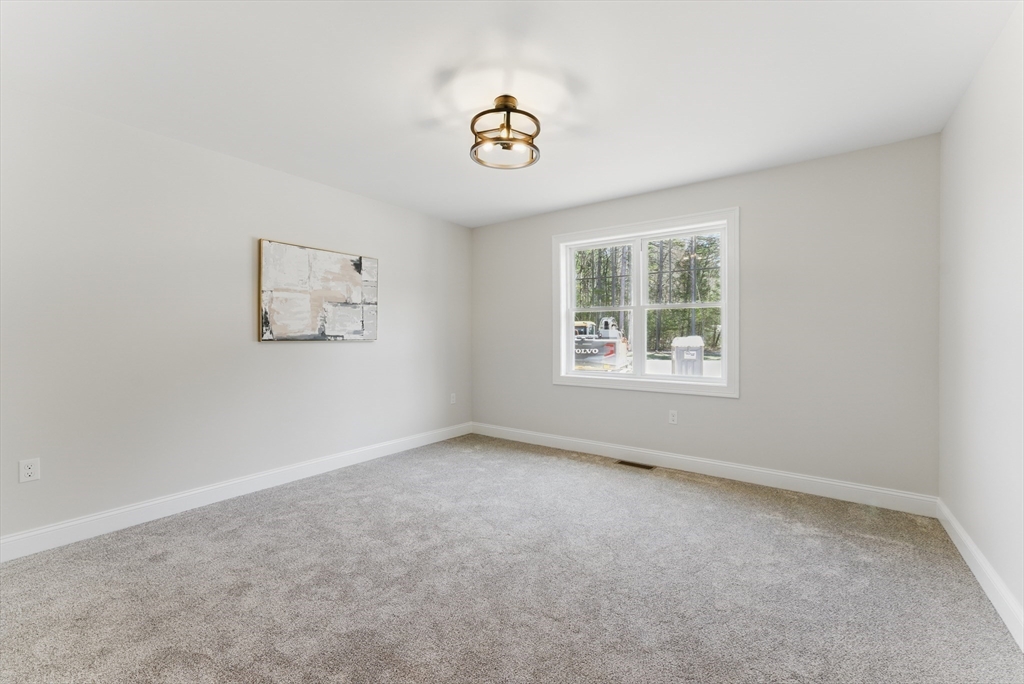 18 Nicols Way, Unit 18 Easthampton, MA 01027 - Photo 25 of 40 an empty room with a window