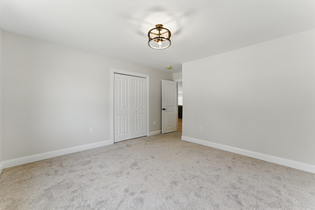 18 Nicols Way, Unit 18 Easthampton, MA 01027 - Photo 26 of 40 a view of an empty room