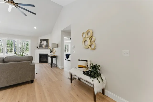 a living room with furniture and a table