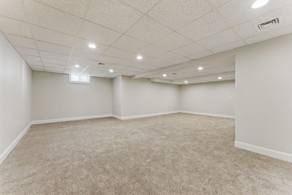 18 Nicols Way, Unit 18 Easthampton, MA 01027 - Photo 31 of 40 an empty room with a natural light