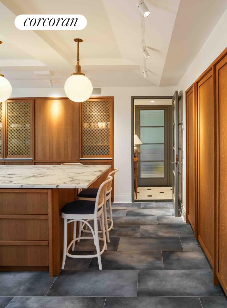 140 Riverside Drive, Unit 19HO Manhattan, NY 10024 - Photo 23 of 35 a view of a room with a table and chairs