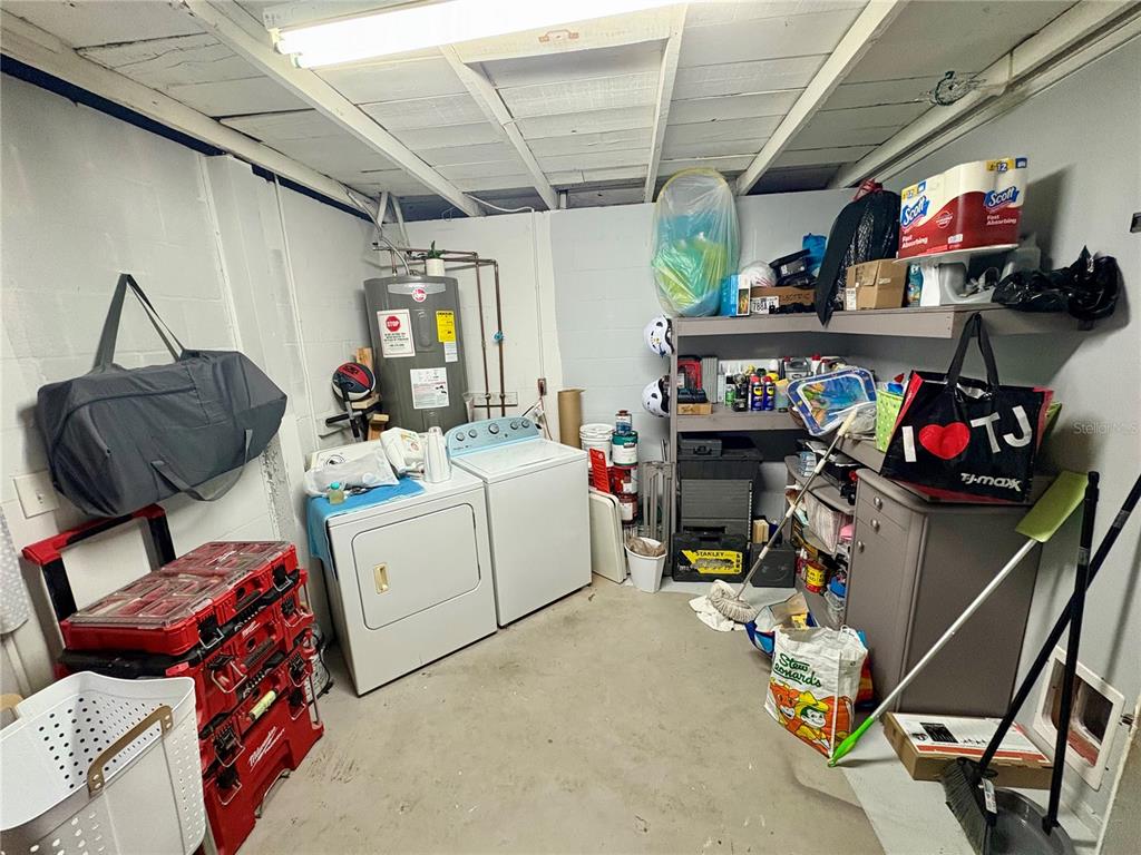8501 Paxton Drive Port Richey, FL 34668 - Photo 13 of 17 a storage room with furniture and toys