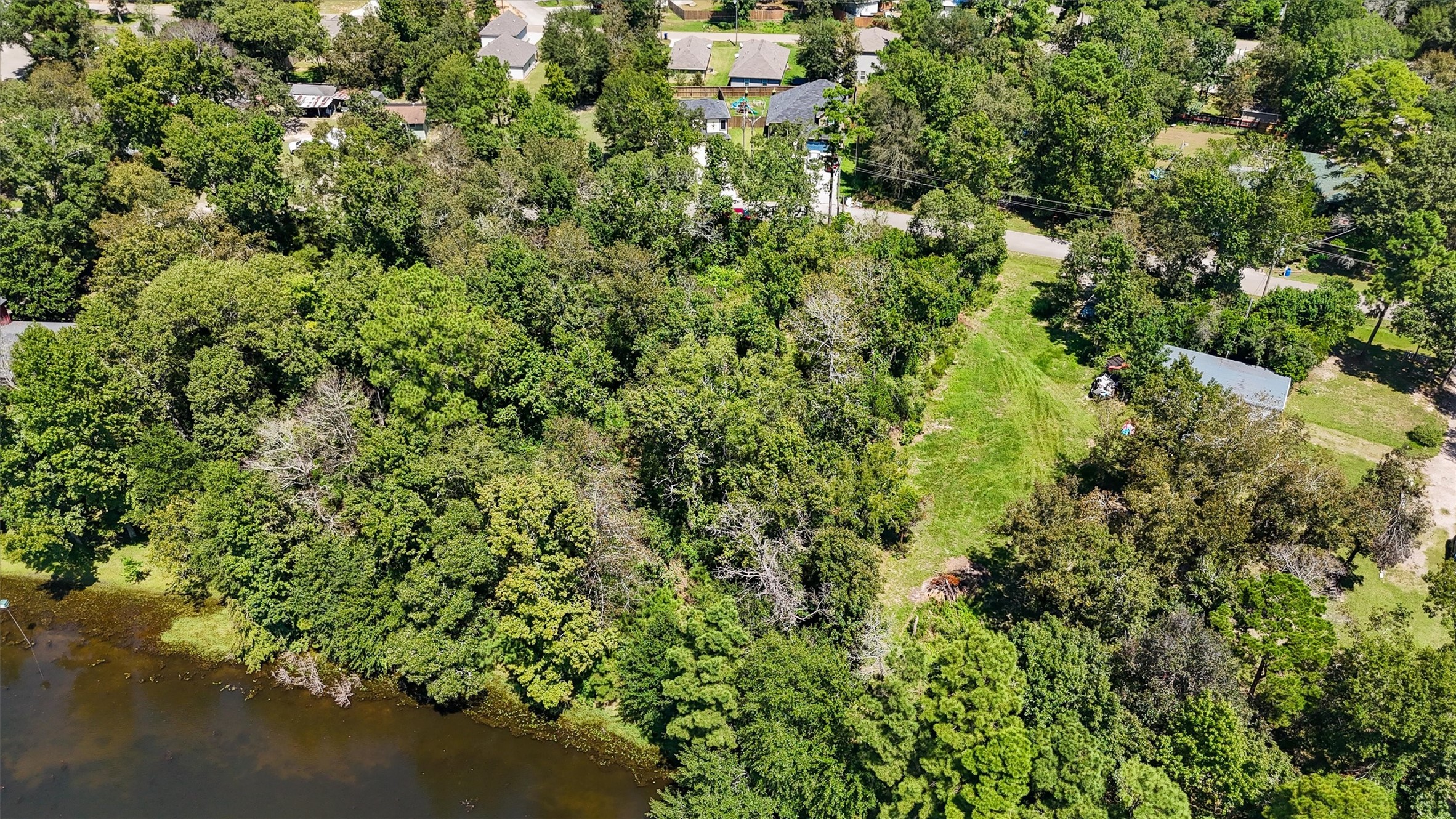 3816 Sam Houston Road Houston, TX 77002 - Photo 4 of 19 an aerial view of residential houses with outdoor space and trees