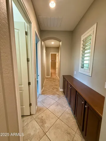 a bathroom with a sink double vanity and a mirror