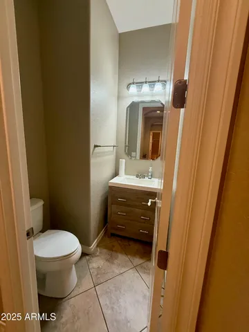 a kitchen with a cabinets and a stove top oven