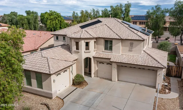 a front view of a house with a garage