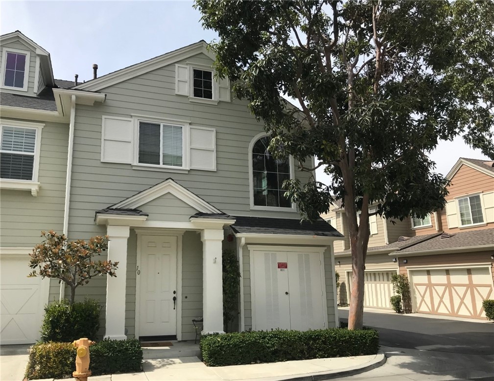 10 Chilmark Street Ladera Ranch, CA 92694 - Photo 13 of 16 a front view of a house with a yard and garage