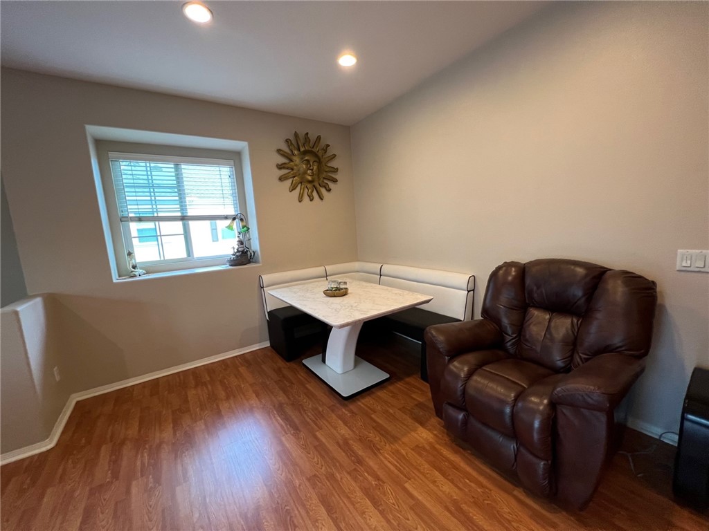 10 Chilmark Street Ladera Ranch, CA 92694 - Photo 3 of 16 a workspace room with furniture and wooden floor