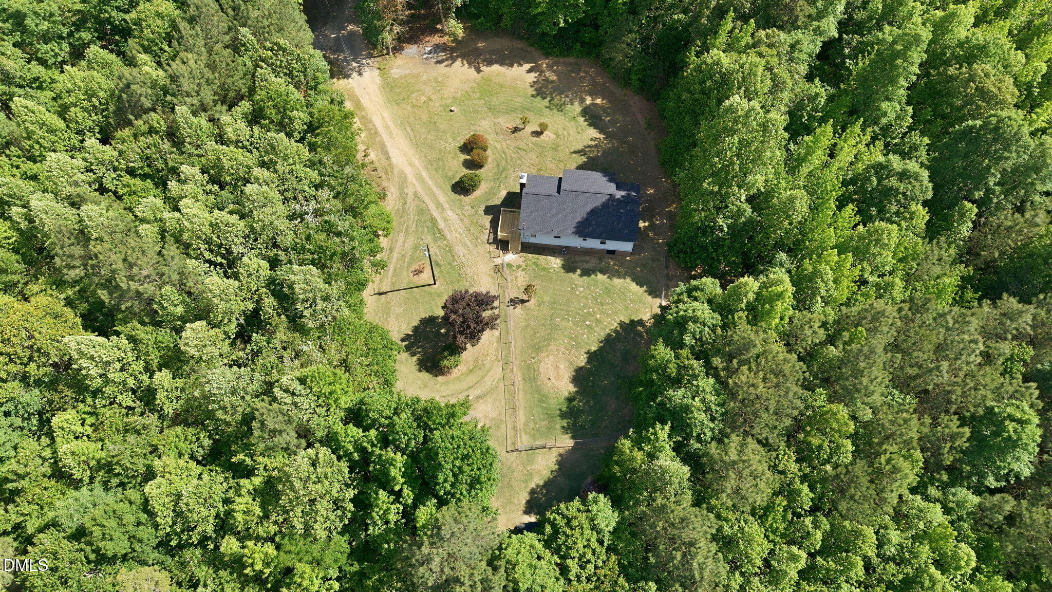 3602 Harrison Road Castalia, NC 27816 - Photo 19 of 48 an aerial view of residential house with outdoor space and trees all around