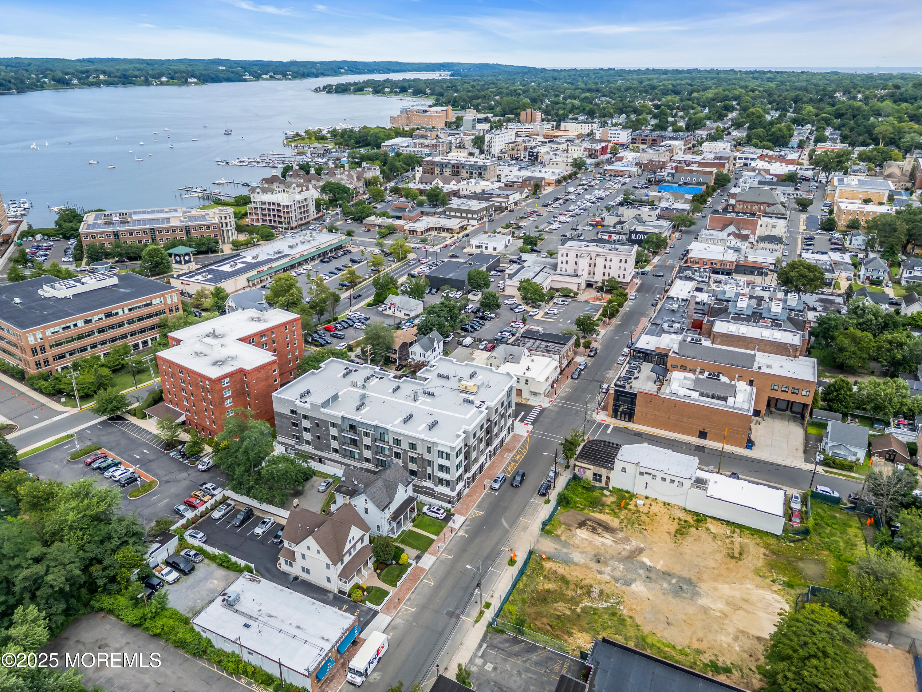 120 Monmouth Street, Unit 210 Red Bank, NJ 07701 - Photo 35 of 37 an aerial view of residential houses with outdoor space