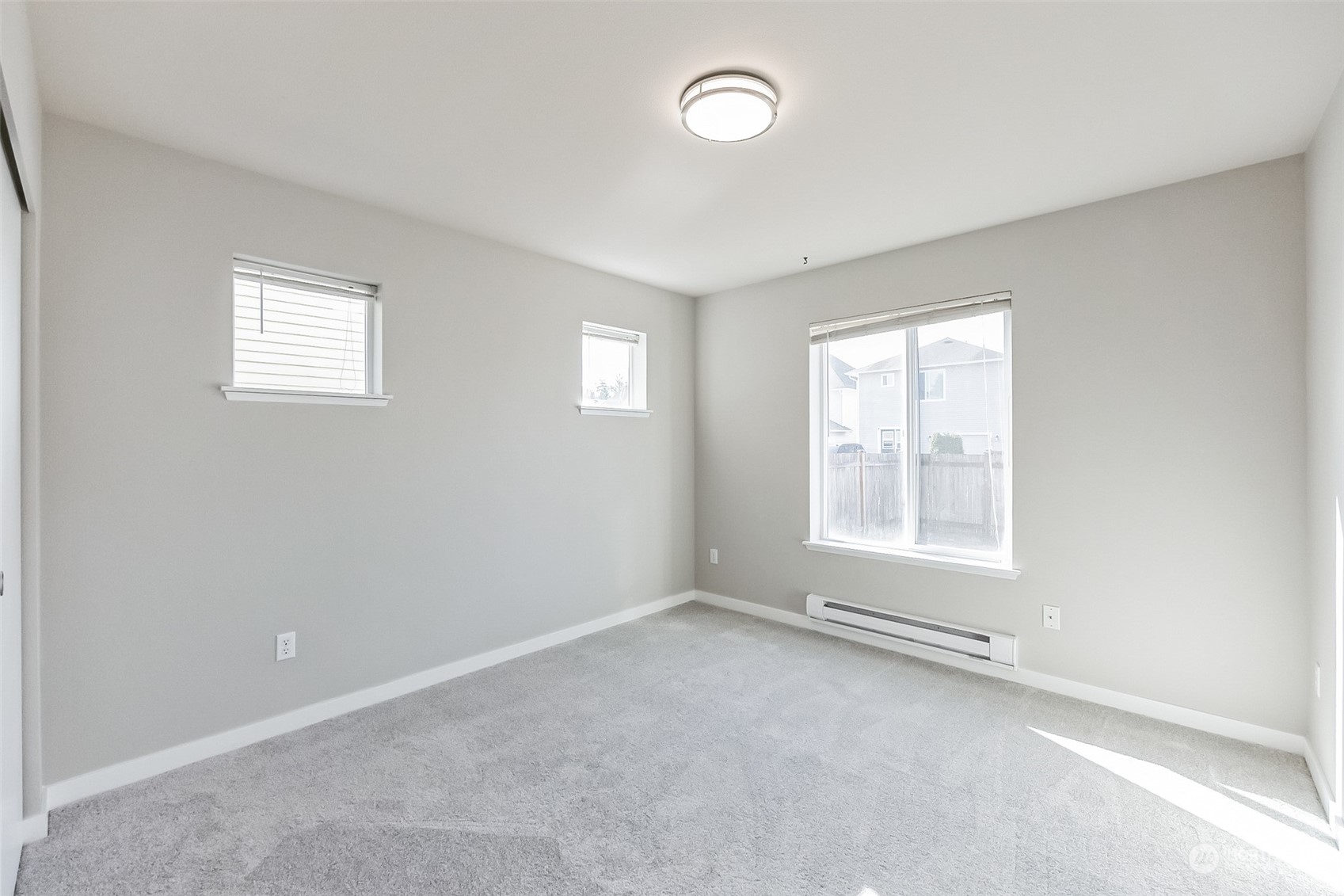 3077 Walker Road DuPont, WA 98327 - Photo 14 of 30 an empty room with a window