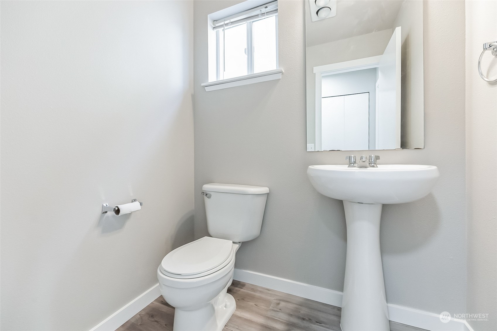 3077 Walker Road DuPont, WA 98327 - Photo 16 of 30 a bathroom with a sink toilet and a mirror