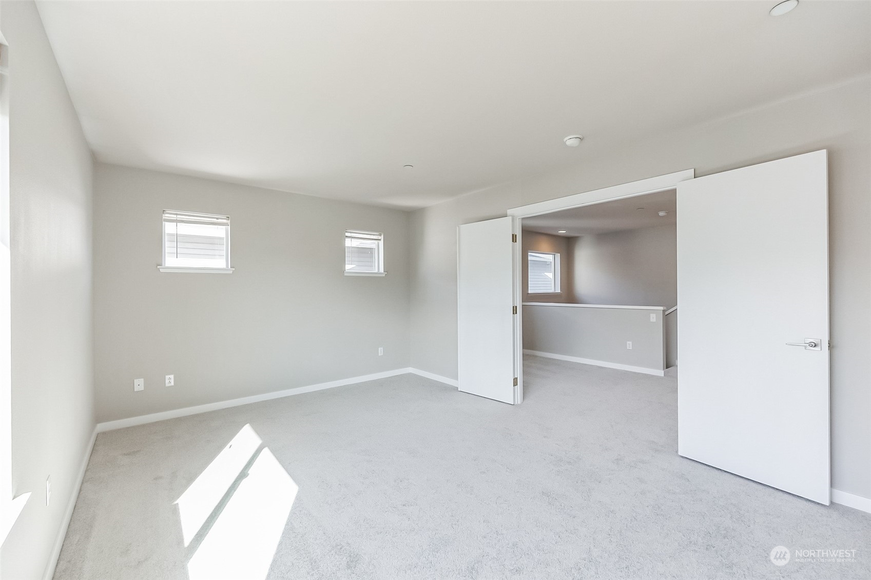 3077 Walker Road DuPont, WA 98327 - Photo 20 of 30 an empty room with windows and closet