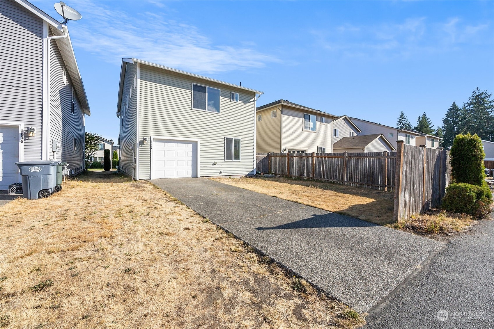 3077 Walker Road DuPont, WA 98327 - Photo 30 of 30 a view of a house with a yard