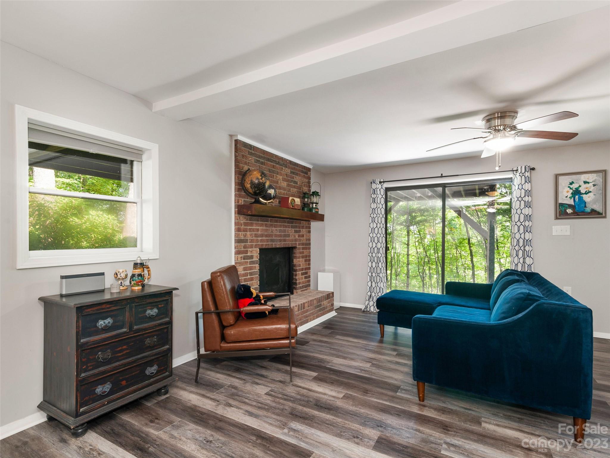 500 Old Country Road Waynesville, NC 28786 - Photo 20 of 38 a living room with furniture and a fireplace