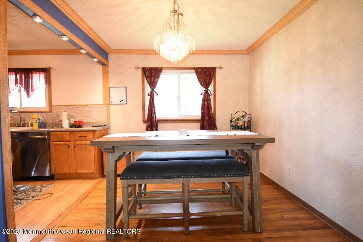 40 Alan Terrace Howell, NJ 07731 - Photo 11 of 48 a room with a table chairs and windows