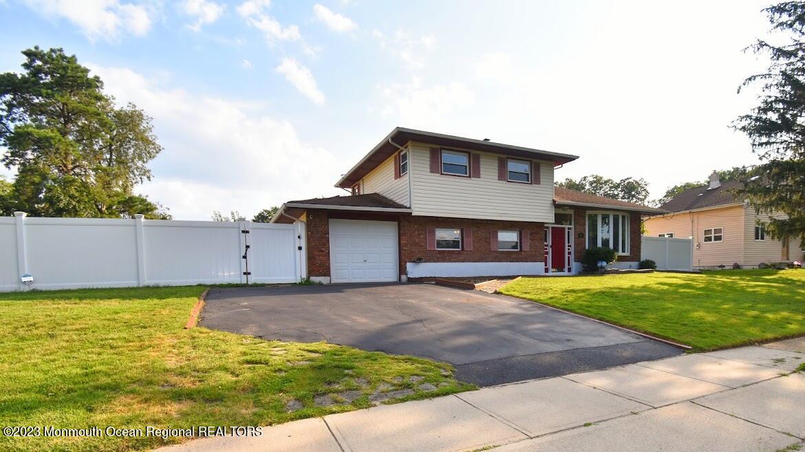 40 Alan Terrace Howell, NJ 07731 - Photo 2 of 48 a house view with a outdoor space