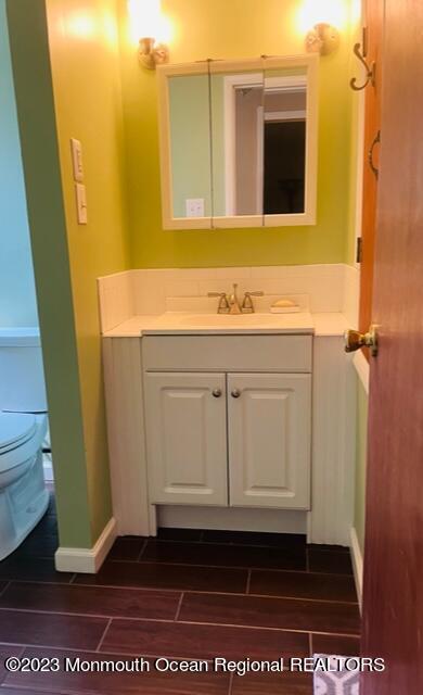 40 Alan Terrace Howell, NJ 07731 - Photo 22 of 48 a bathroom with a sink and a mirror