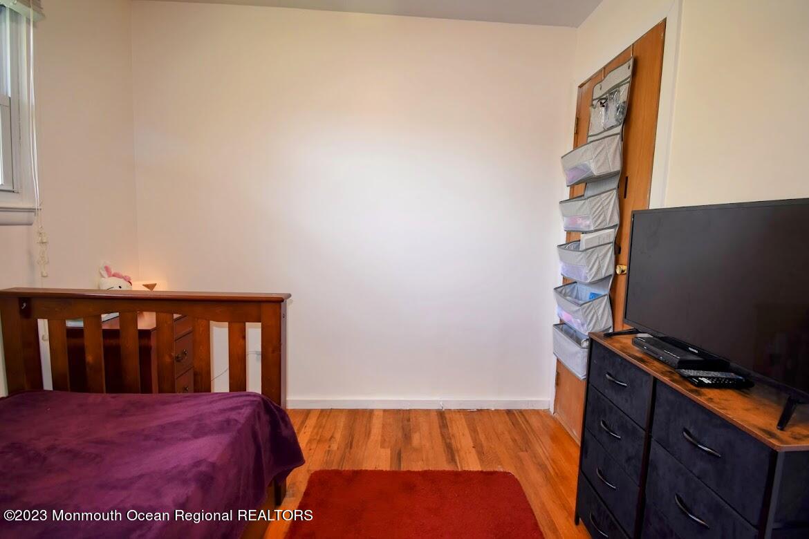 40 Alan Terrace Howell, NJ 07731 - Photo 23 of 48 a bedroom with a bed and a window