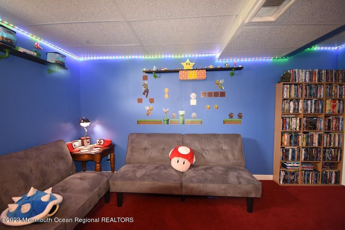 40 Alan Terrace Howell, NJ 07731 - Photo 39 of 48 a room with furniture and screen