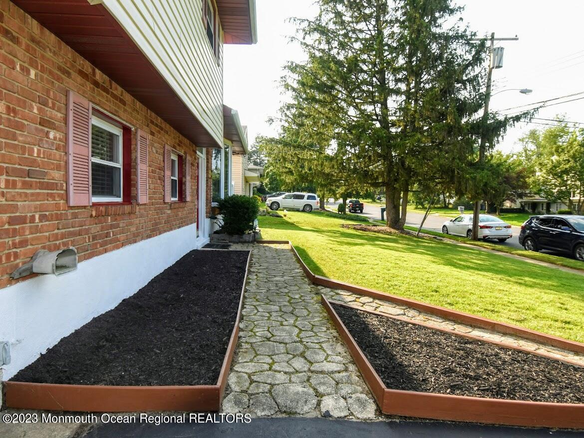 40 Alan Terrace Howell, NJ 07731 - Photo 4 of 48 a view of swimming pool with a yard
