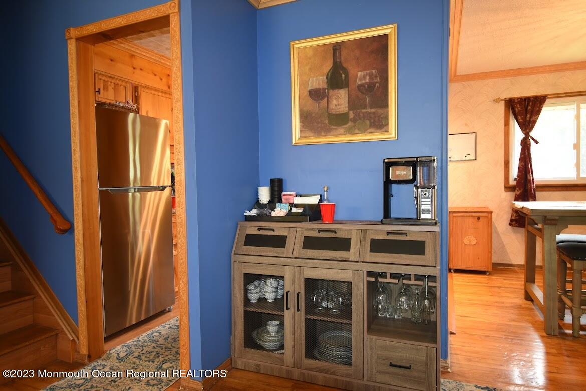 40 Alan Terrace Howell, NJ 07731 - Photo 8 of 48 a kitchen with stainless steel appliances granite countertop a stove a refrigerator and a dining table