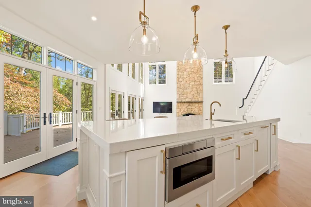 a bathroom with a double vanity sink mirror and double