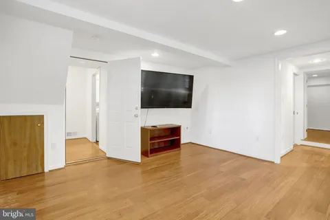 a kitchen with a sink and large window