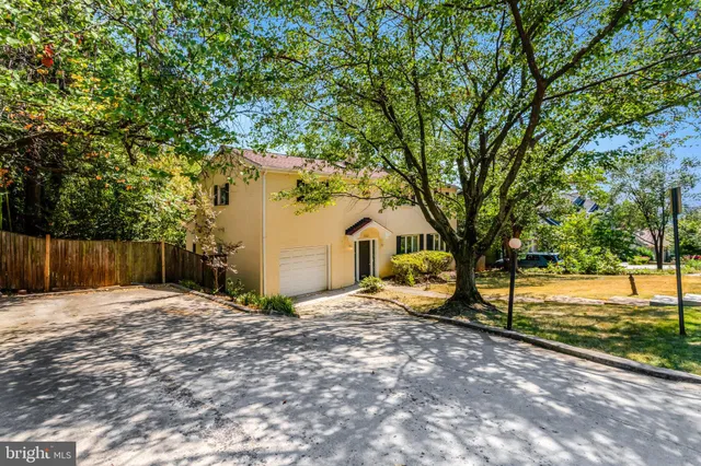 a view of a backyard of the house