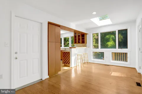 a spacious bathroom with a bathtub sink and toilet