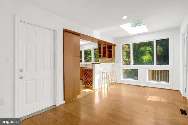 a spacious bathroom with a bathtub sink and toilet