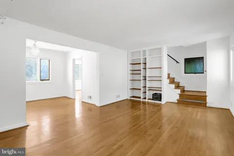 a view of a livingroom with a hardwood and a living room