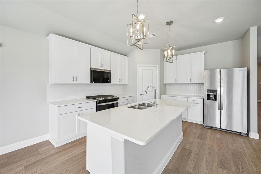 6210 Timberhurst Drive McKinney, TX 75071 - Photo 1 of 1 Photo is not of the actual home, but is an inspirational photo of builder’s model home and may depict options, furnishings, and/or decorator features that are not included.