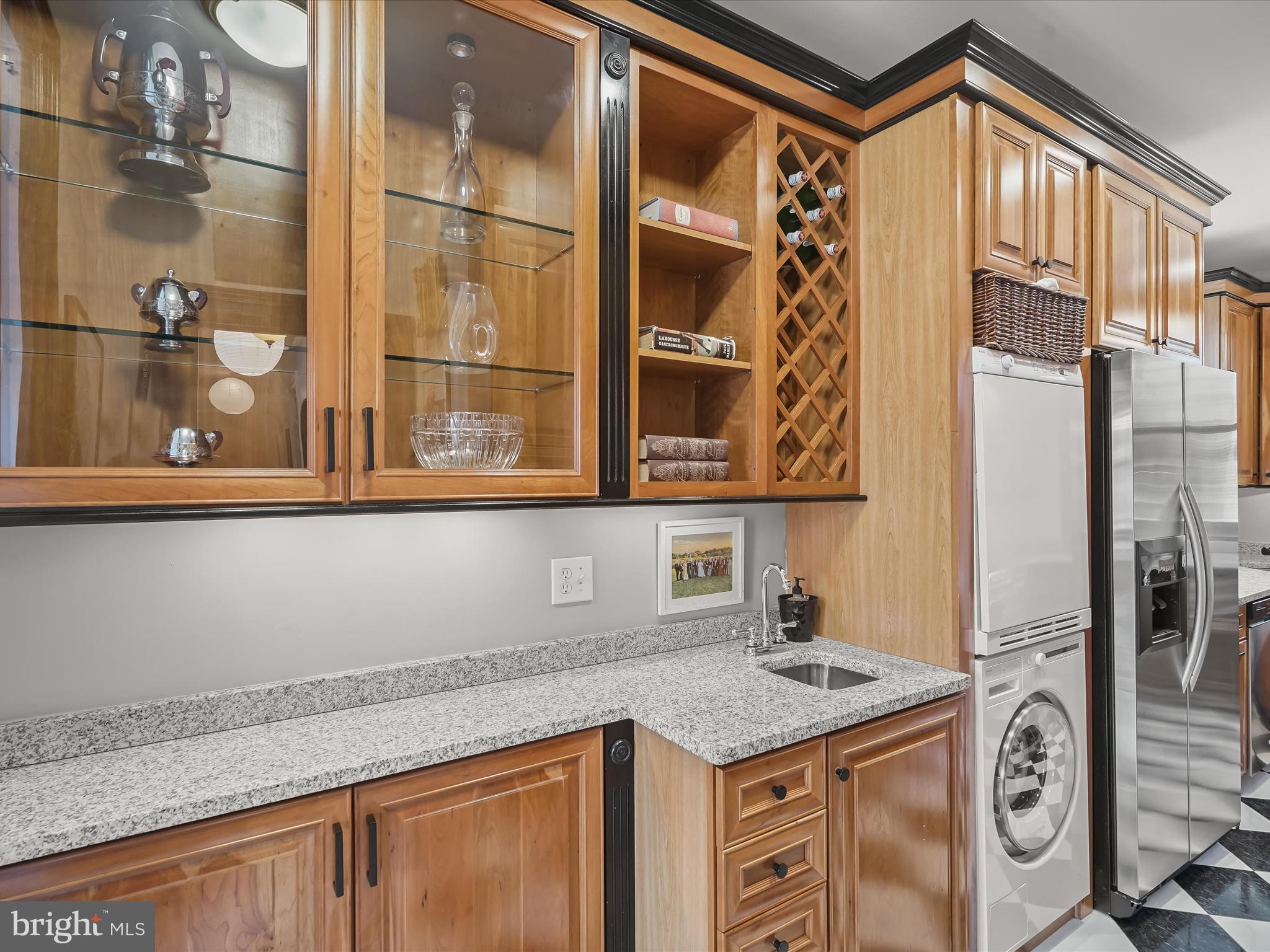 2220 20th Street Northwest, Unit 46 Washington, DC 20009 - Photo 11 of 26 a bathroom with a granite countertop sink and a shower
