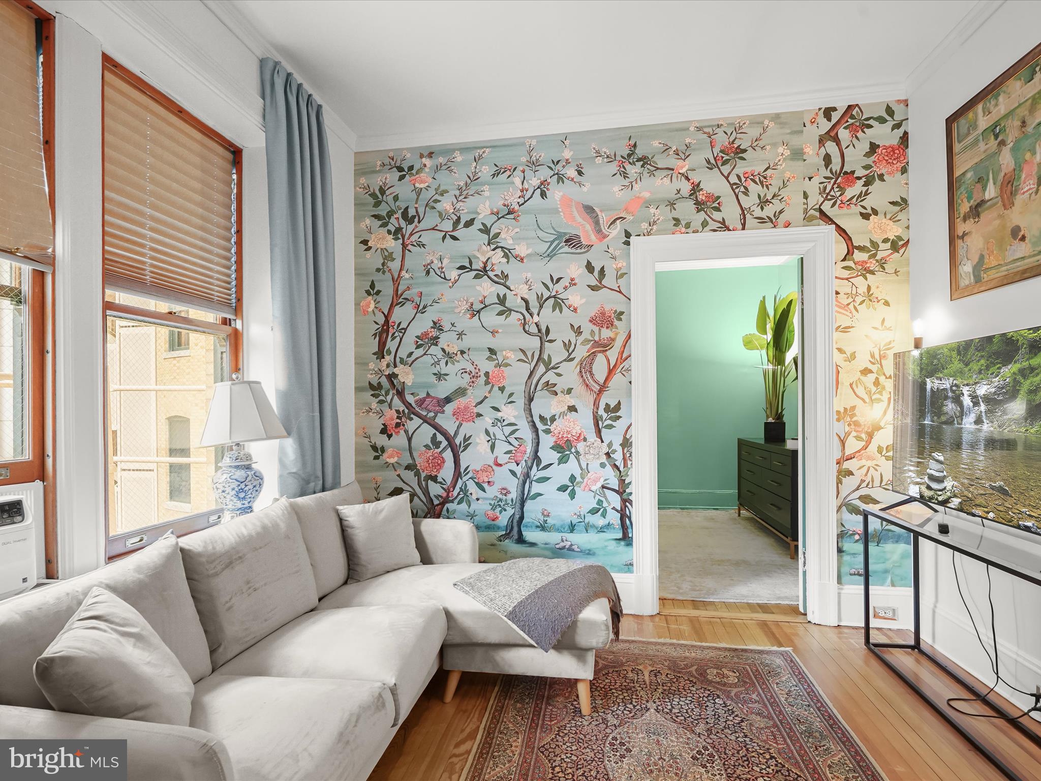 2220 20th Street Northwest, Unit 46 Washington, DC 20009 - Photo 15 of 26 a living room with furniture and a floor to ceiling window