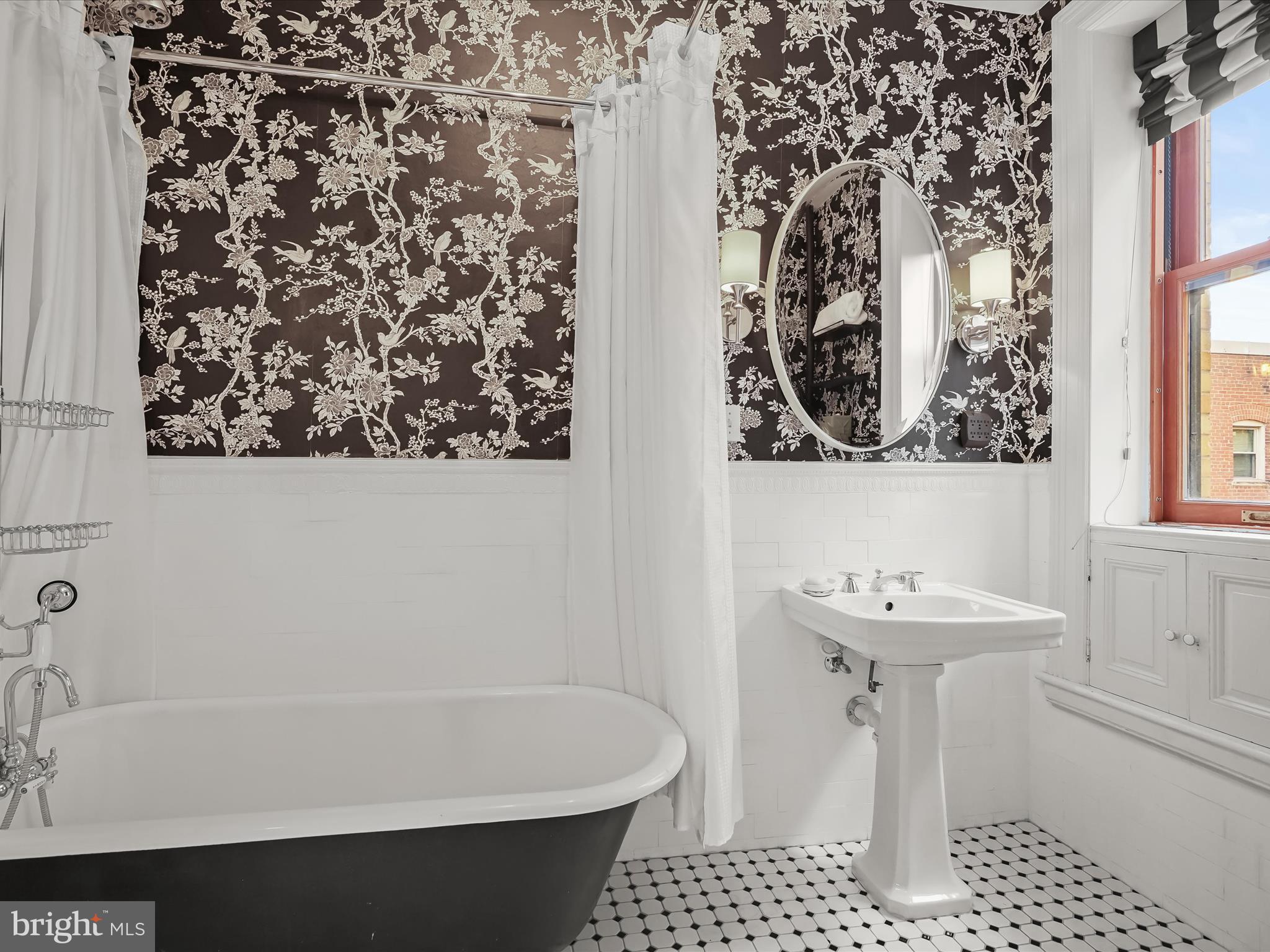 2220 20th Street Northwest, Unit 46 Washington, DC 20009 - Photo 18 of 26 a bathroom with a sink toilet and shower