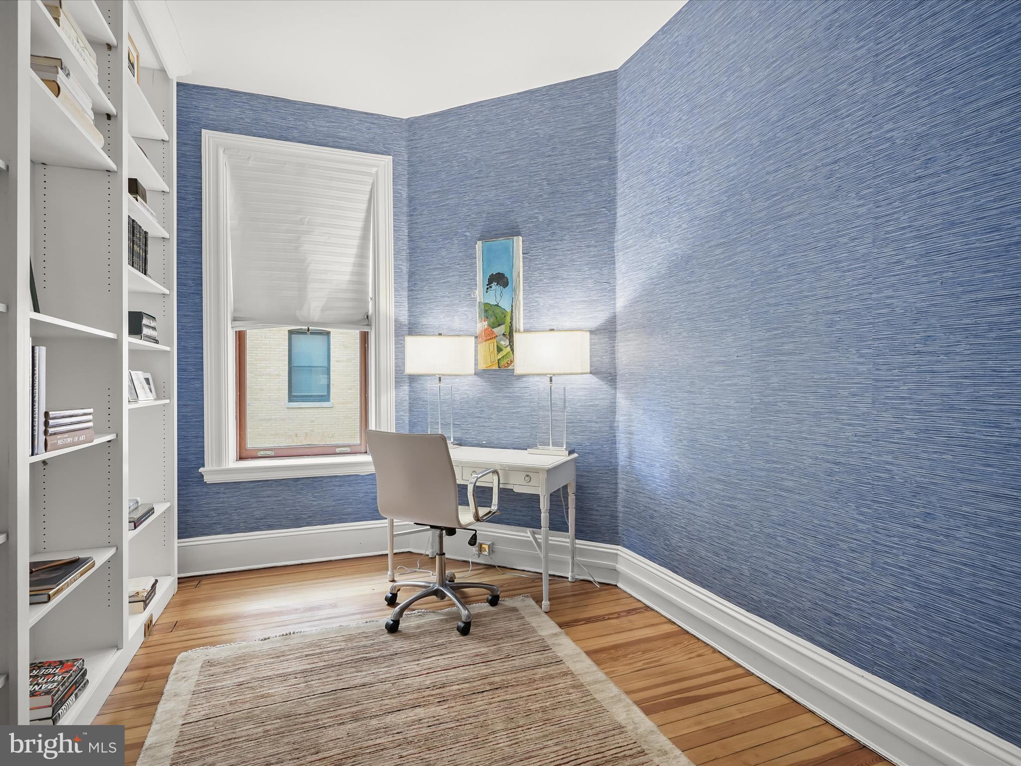 2220 20th Street Northwest, Unit 46 Washington, DC 20009 - Photo 19 of 26 a workspace with wooden floor and a window