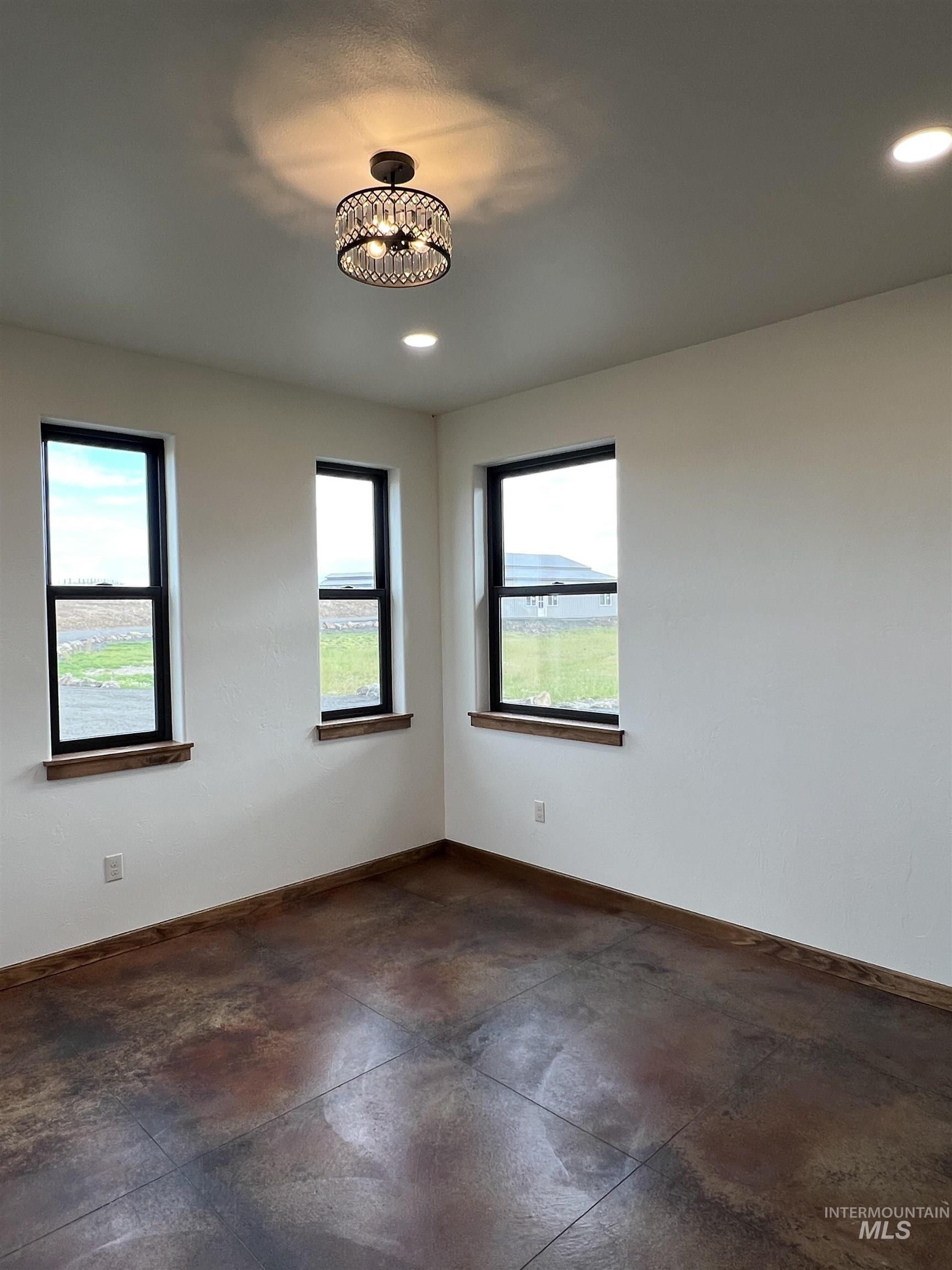137 Angus Ranch Grangeville, ID 83530 - Photo 5 of 32 Spare room featuring baseboards and recessed lighting