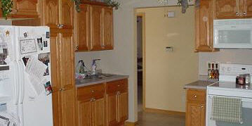 9948 Rambouillet Ridge Roscoe, IL 61073 - Photo 3 of 6 a bathroom with a granite countertop sink a vanity and a shower