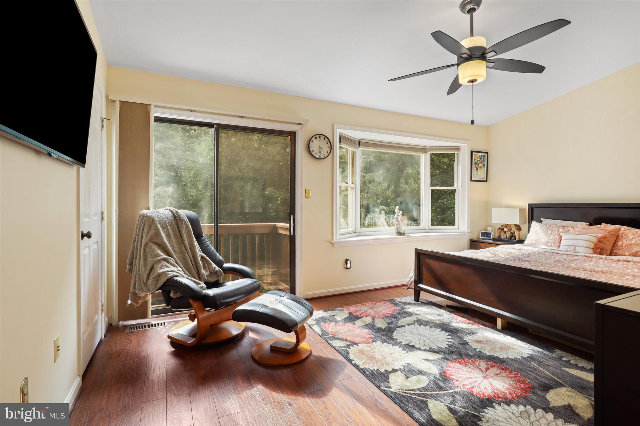 9097 Golden Sunset Lane Springfield, VA 22153 - Photo 15 of 40 Master Bedroom with huge windows and pvt balcony