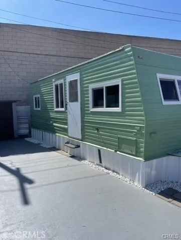 a front view of a house with garage