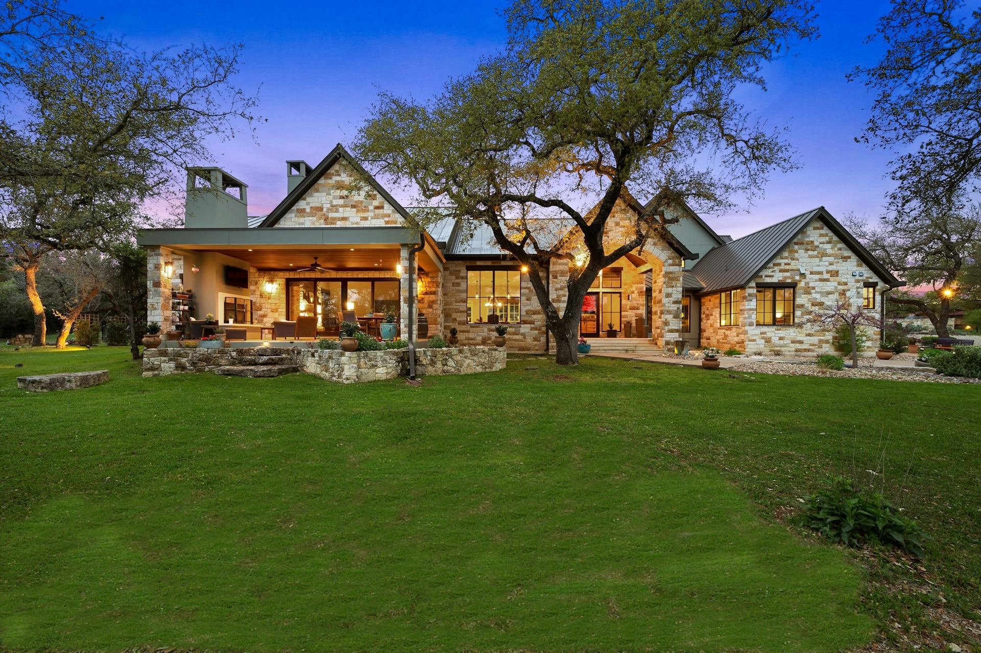1330 Ranchers Club Lane Driftwood, TX 78619 - Photo 2 of 40 a view of a house with a big yard